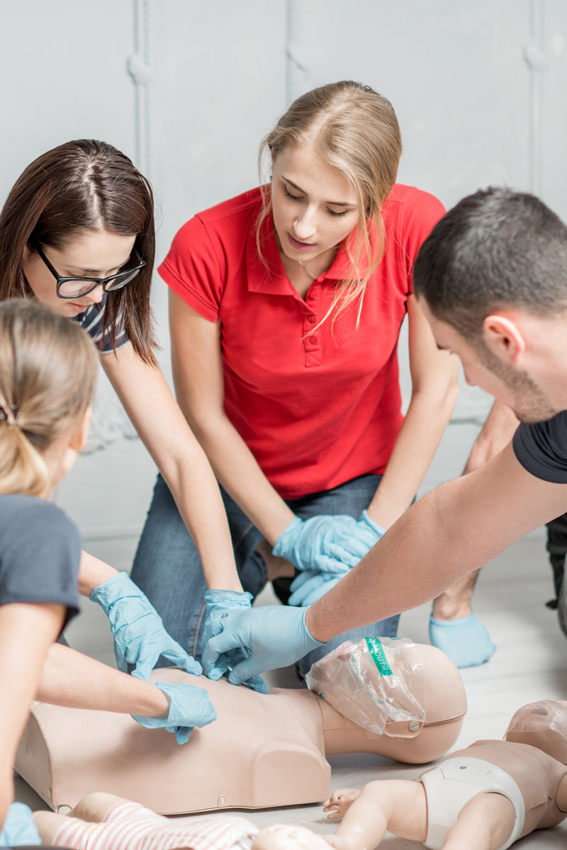 Lifework Instructor teaches students how to perform CPR.